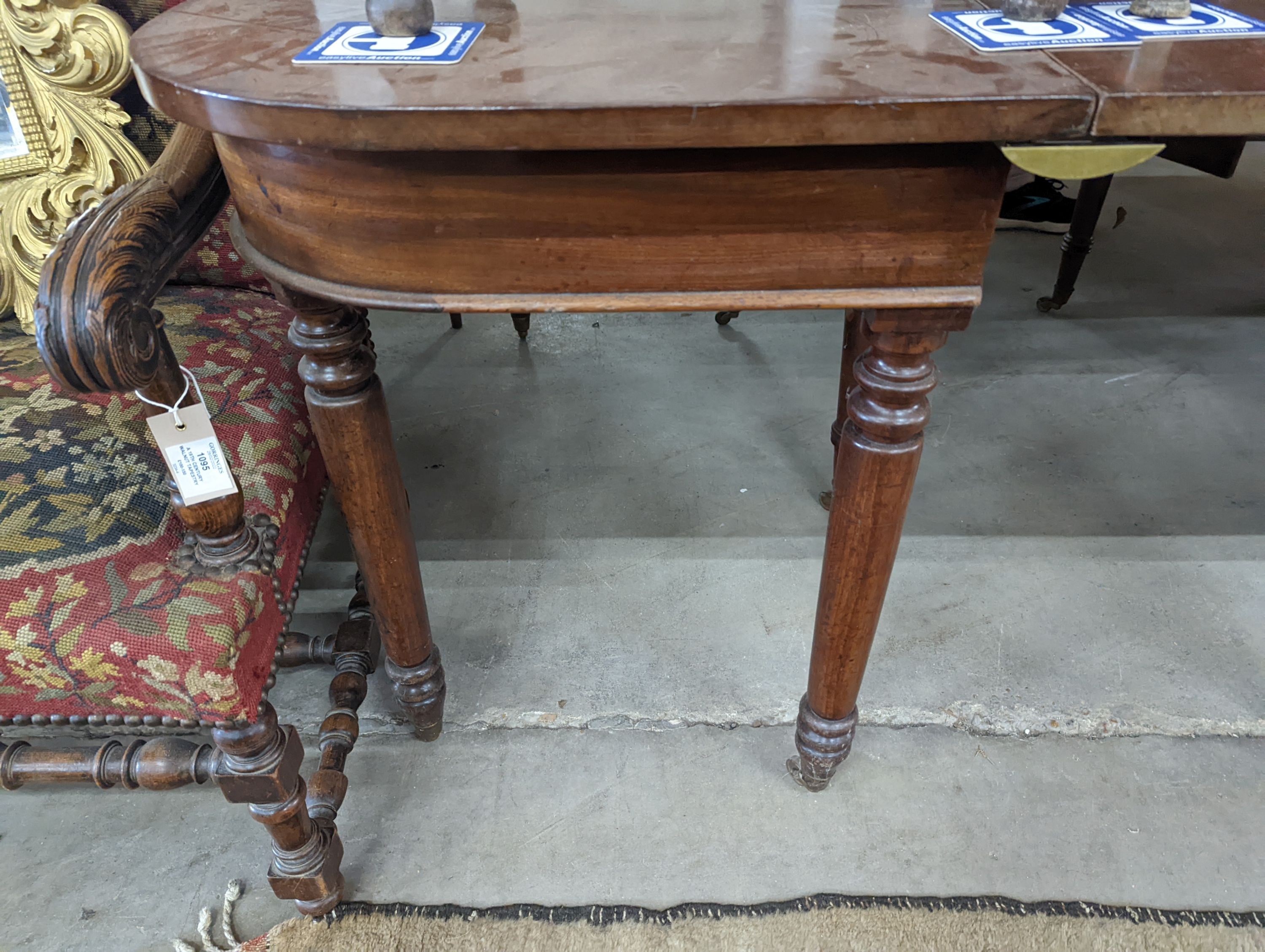 A George IV mahogany D end drop leaf extending dining table, 266cm extended, width 121cm, height 74cm